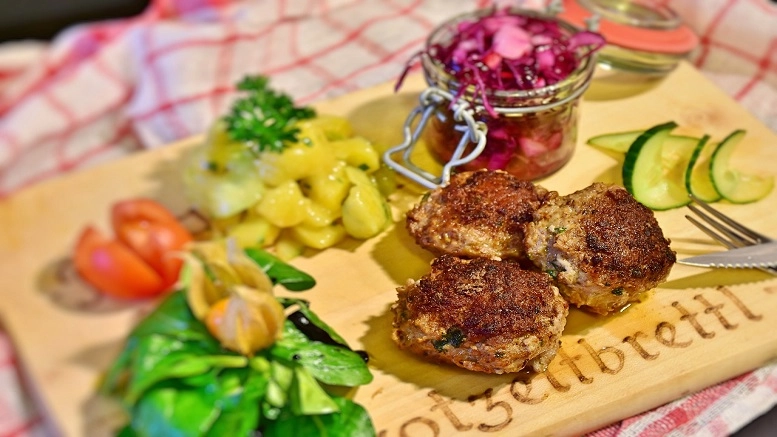 Moroccan lamb meatballs with harissa and couscous