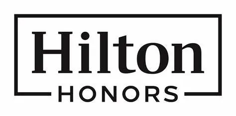 The logo for the company Hilton Honors.